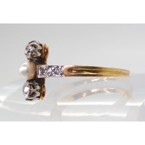 2770 - A VINTAGE DIAMOND & PEARL RINGthe twin diamonds are estimated approx 0.30cts combined, with furt... 