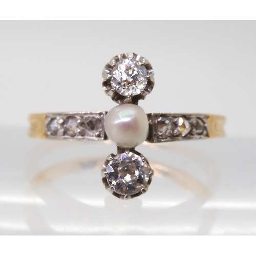 2770 - A VINTAGE DIAMOND & PEARL RINGthe twin diamonds are estimated approx 0.30cts combined, with furt... 