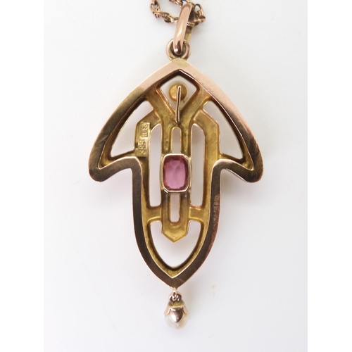 2773 - AN EDWARDIAN ROSE GOLD PENDANTset with pearl & pink tourmaline, stamped indistinctly 9ct, with t... 