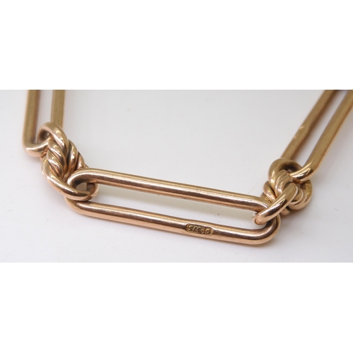 2778 - A 9CT ROSE GOLD FOB CHAINwith long and decorative knotted links, hallmarked 9 .375 to every link, 'T... 