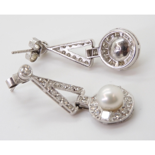 2780 - A PAIR OF DIAMOND & PEARL EARRINGSthe white pearls are approximately 6.4mm and surrounded with p... 