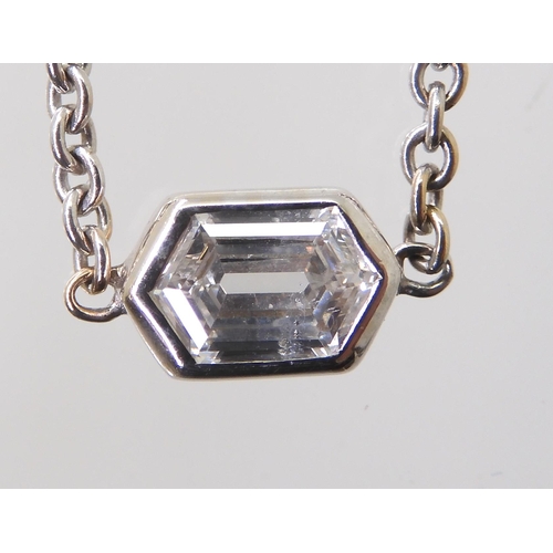 2781 - A DIAMOND SOLITAIRE PENDANTset with an unusual octagonal cut diamond with an estimated approx carat ... 