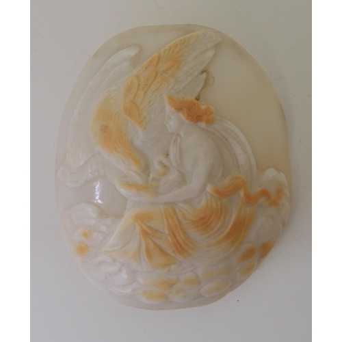 2807 - A LARGE UNMOUNTED CLASSICAL CAMEOfinely carved in two-tone shell, depicting Hebe feeding her father ... 