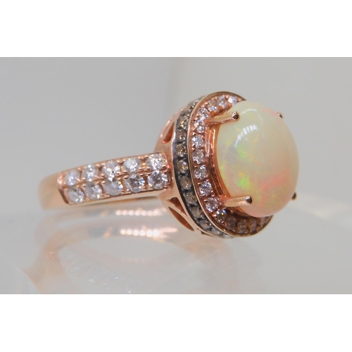 2816 - A LE VIAN OPAL & DIAMOND RINGmounted in 14k rose gold, and set with estimated approx 0.50cts of ... 