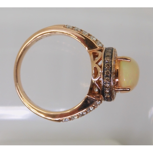 2816 - A LE VIAN OPAL & DIAMOND RINGmounted in 14k rose gold, and set with estimated approx 0.50cts of ... 