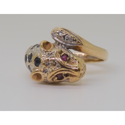 2820 - A 9CT GOLD LEOPARD RINGwith sapphire set spots, ruby eyes and diamond accents to the tail and the he... 