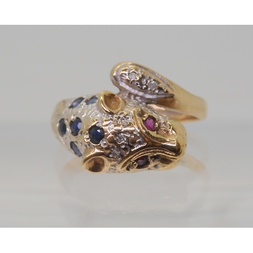 2820 - A 9CT GOLD LEOPARD RINGwith sapphire set spots, ruby eyes and diamond accents to the tail and the he... 