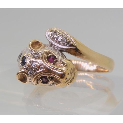 2820 - A 9CT GOLD LEOPARD RINGwith sapphire set spots, ruby eyes and diamond accents to the tail and the he... 