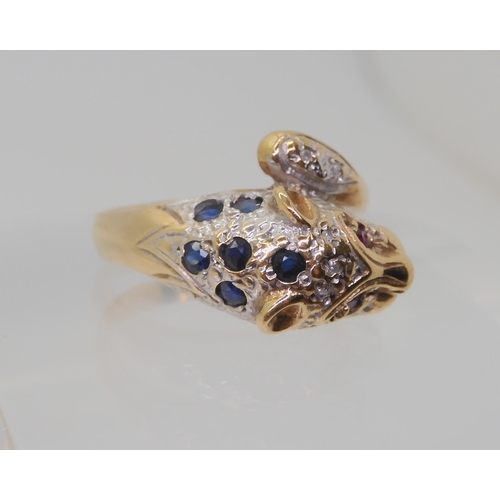 2820 - A 9CT GOLD LEOPARD RINGwith sapphire set spots, ruby eyes and diamond accents to the tail and the he... 