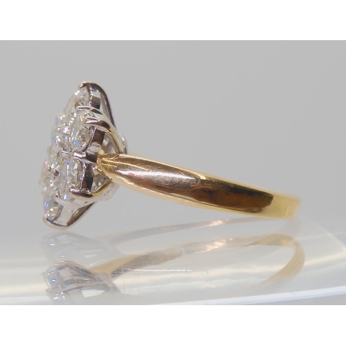 2821 - A SUBSTANTIAL DIAMOND FLOWER RINGthe 18ct gold mount is set with estimated approx 1.5cts of brillian... 