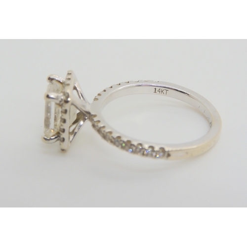 2714 - A 14K WHITE GOLD SUBSTANTIAL DIAMOND RINGset with an estimated approx 1.40ct step cut diamond, with ... 