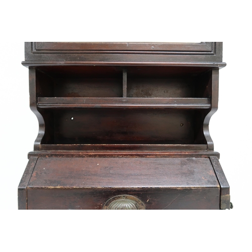 14 - A LATE VICTORIAN MAHOGANY SHIPS CABIN WASHSTAND with rectangular mirror over open shelves over ... 