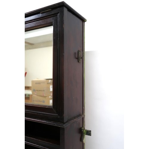 14 - A LATE VICTORIAN MAHOGANY SHIPS CABIN WASHSTAND with rectangular mirror over open shelves over ... 