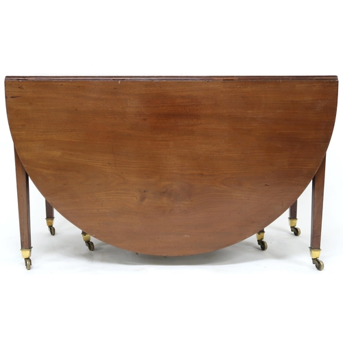 61 - A VICTORIAN MAHOGANY DROPLEAF TABLE with oval drop leaf top on square tapering supports terminating ... 