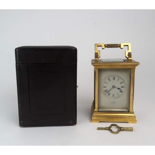 276 - A 19th century French brass and glass carriage clock with silvered dial, and roman numerals, re... 