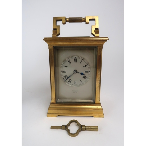 276 - A 19th century French brass and glass carriage clock with silvered dial, and roman numerals, re... 