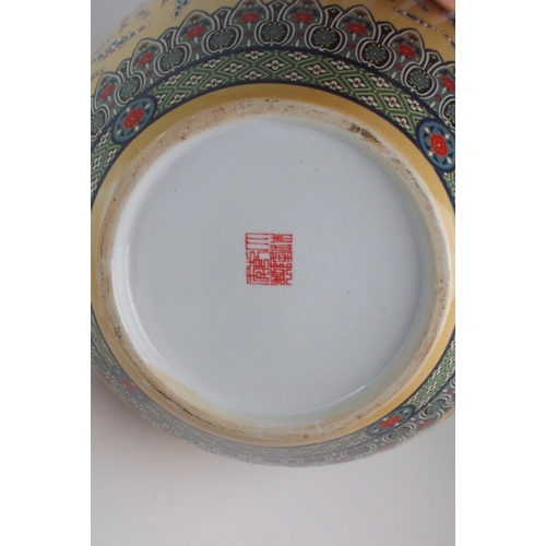 307 - A MODERN CHINESE BALUSTER VASEPainted and printed with roundels of pearls on foaming seas, divided b... 