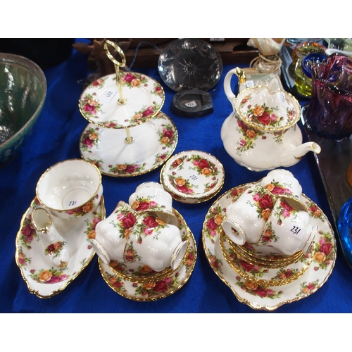 325 - A Royal Albert Old Country Roses teawares comprising teapot, cake stand, six cups, saucers and ... 