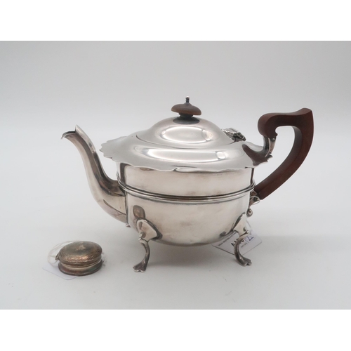 440 - A George V silver tea pot, by Adie Brothers Ltd, Birmingham 1932, of rounded squat form, on three pa... 