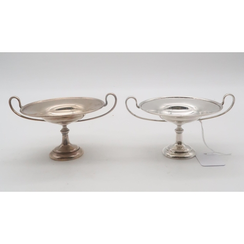 450 - A pair of silver tazzas, by Holland, Aldwinkle & Slater, London 1903, 7.5cm high, 290gms (2)