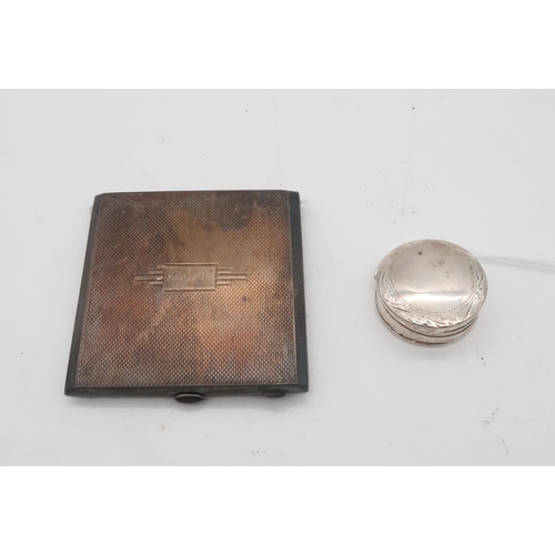 456 - A silver compact, by R N Hollings & Co, Birmingham 1946, engraved 'Catherine', and a stampe... 