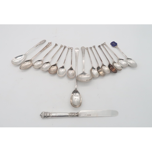 457 - A collection of silver flatware, including a presentation curling spoon inscribed 'Dumbartonshire Ri... 