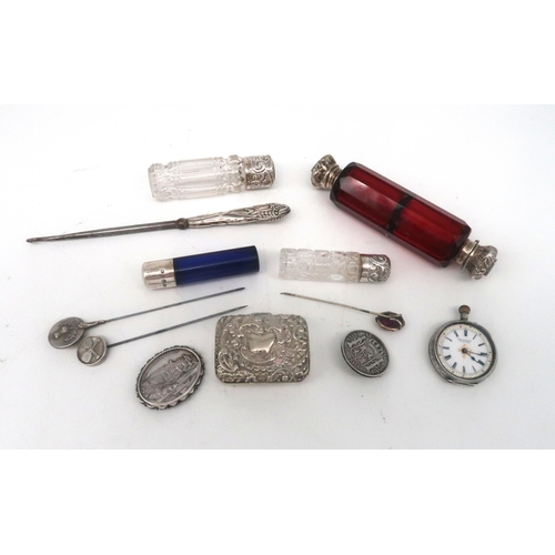 468 - A collection of silver and white metal including a ruby glass and white metal mounted double ended s... 