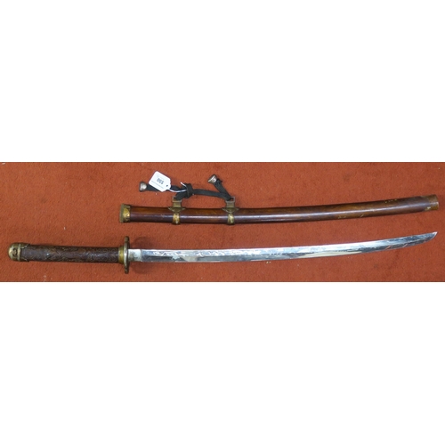 550 - A decorative Japanese katana, two Indian sabres, a thornwood walking cane and a further example (5)