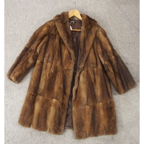 249 - A dark brown fur coat