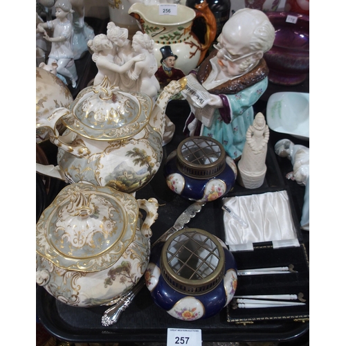 257 - A Victorian tobacco jar, modelled as an elderly man reading the North British Daily Mail newspaper, ... 