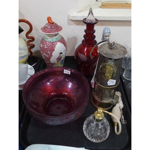 258 - An Eccles safety lamp, a Royal Brierley lustre glass lamp, a Chinese jar and cover, a Carlton Ware d... 