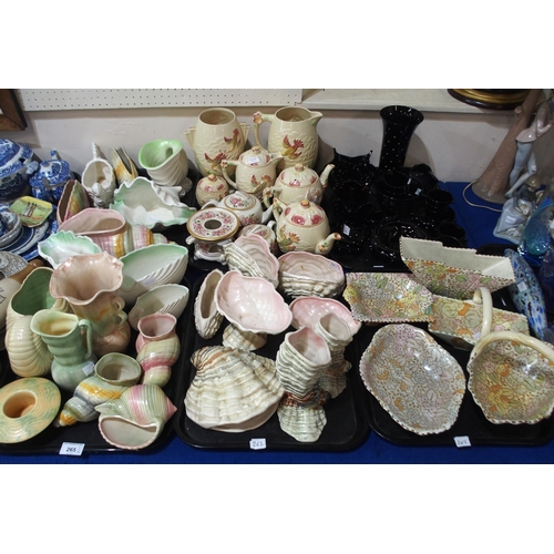 265 - A large collection of Shorter and Son pottery, mainly shell shaped vases, jugs etc, Decoro pottery d... 