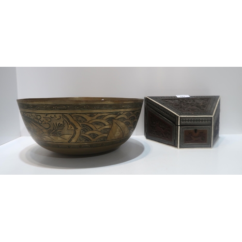 293 - A Burmese carved wooden writing box together with a large brass bowl