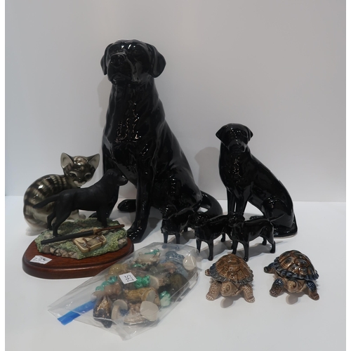 295 - A Beswick Fireside Seated Black Labrador in gloss finish, model no. 2314, other smaller examples, a ... 