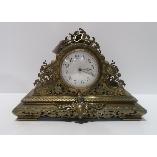 296 - A brass mantle clock, marked E.G.L to movement