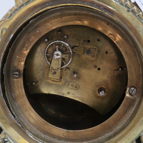 296 - A brass mantle clock, marked E.G.L to movement