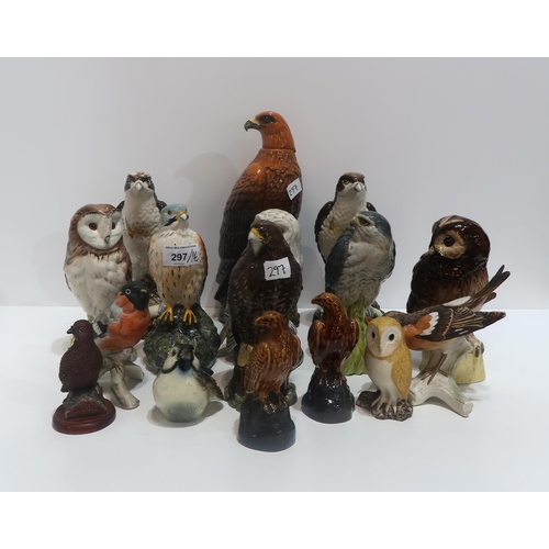 297 - A collection of Royal Doulton bird decanters, mainly birds of prey and owl, together with other bird... 