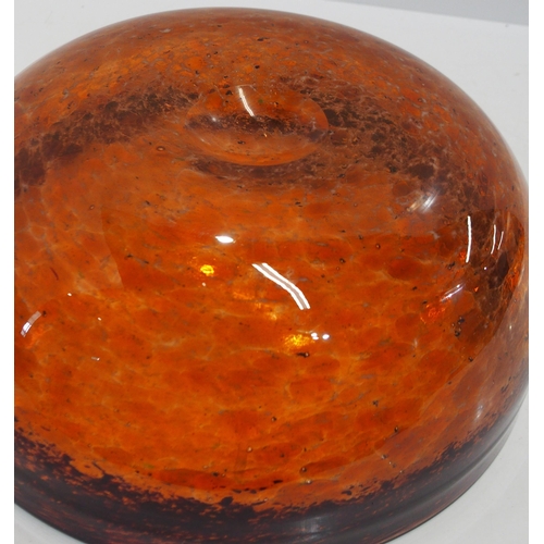 299 - A Scottish glass bowl in mottled orange with brown border