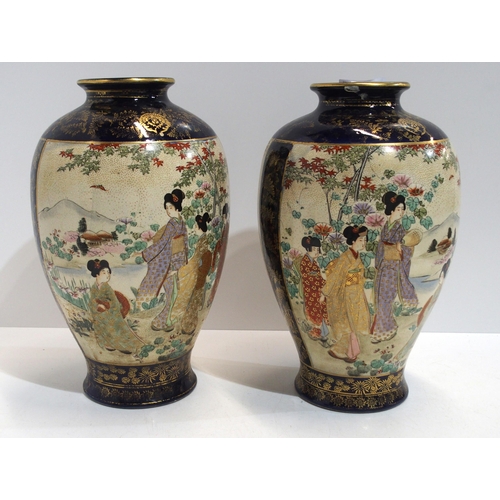 308 - A pair of Satsuma vases, signed Kusube, of baluster form, the blue ground gilt decorated, each with ... 