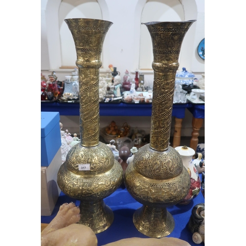 317 - A large pair of Indian brass vases with pierced decoration