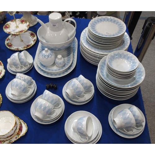 324 - A Rosenthal porcelain Blue Lotus pattern dinner service comprising two oval platters, coffee pot ele... 