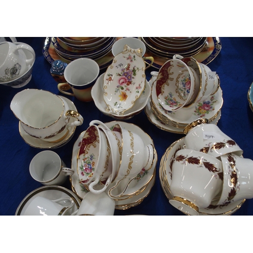 334 - A Victoria China desert scene decorated coffee set, Royal Albert Canterbury cups, Paragon Elegance t... 