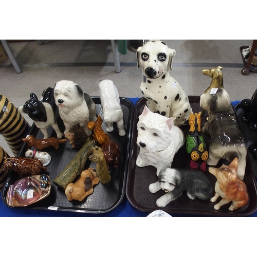 342 - A quantity of cat and dog figures including two large painted wooden figures