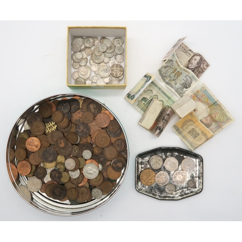 512 - A mixed lot of British and worldwide coins and banknotes with some pre 1947 British examples