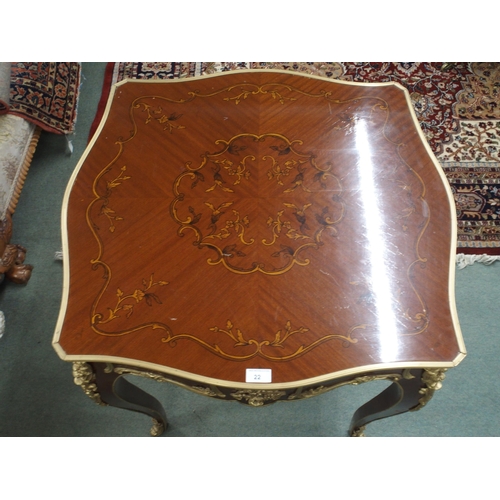 22 - A 20th century Louis XV style centre table with marquetry inlaid quarter veneered top on cabriole su... 