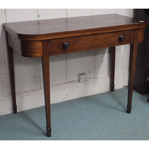 24 - A Victorian mahogany fold-over tea table with single drawer on square tapering supports, 76cm high x... 