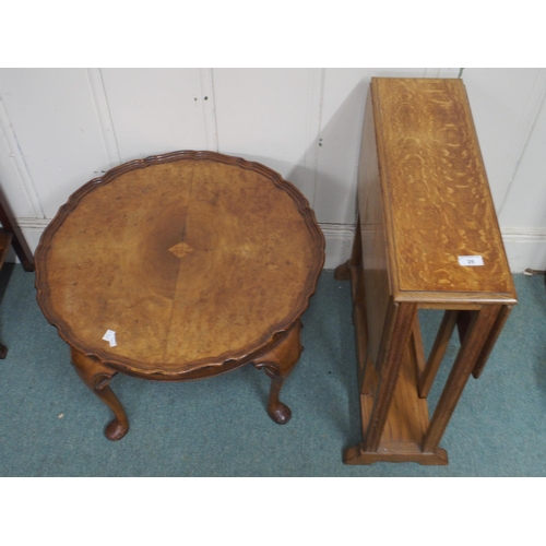 25 - An early 20th century oak Sutherland table and a pie crust edged circular occasional table (2)