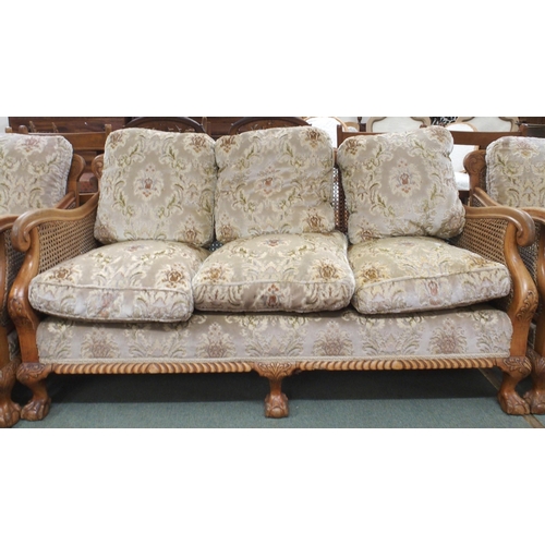 57 -  A 20th century three piece bergere parlour suite comprising three seater settee, 80cm high x 1... 