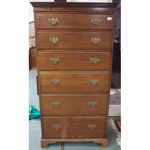 65 - A 20th century mahogany tall chest of drawers with dentil cornice over six long drawers on bracket b... 