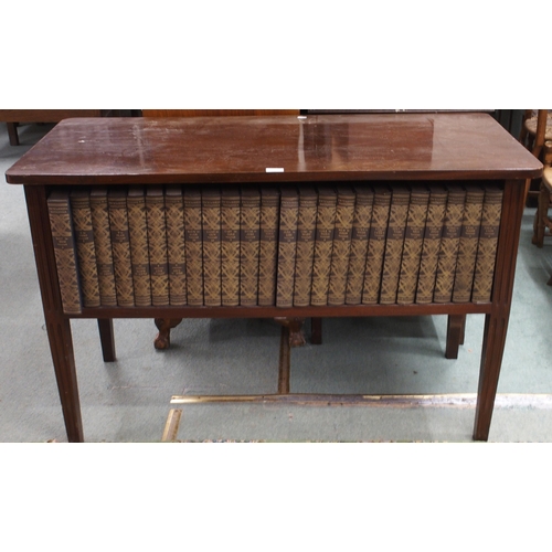 66 - A 20th century mahogany bookcase table with twenty four volumes of encyclopaedia Britannica, 77cm hi... 